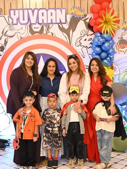 A happy group photo with the little superheroes and their moms. I believe a great kids' party is one where the parents can relax and have fun too.