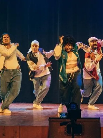 A dynamic shot of our instructors mid-performance, showcasing the energy and creativity that defines our studio's style.