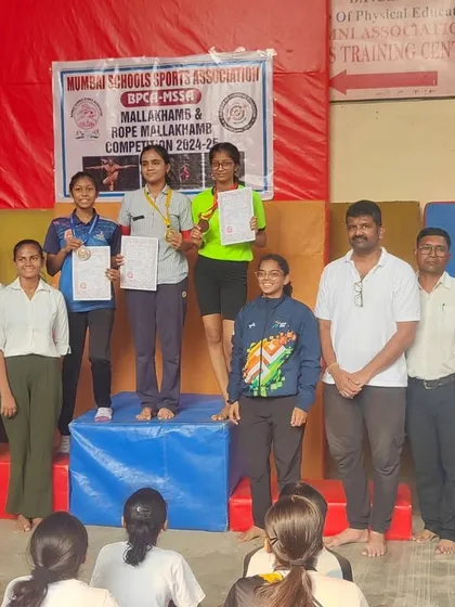 The winners' podium at the MSSA competition, with our student Twarita proudly standing in 3rd place. She is surrounded by coaches and officials, celebrating the achievements of all the talented athletes.
