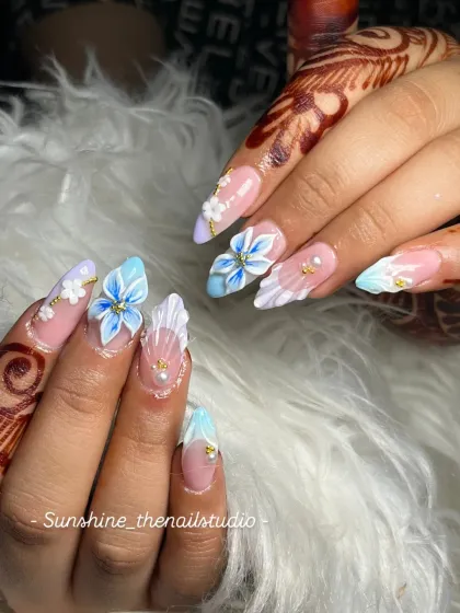 A different angle of the intricate blue 3D flower bridal set.