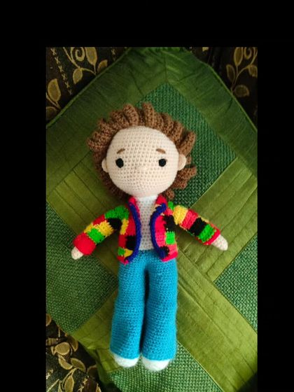 This doll is ready for a concert in his colorful jacket. I can create any character or person you want.