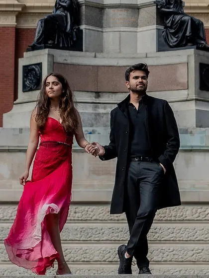 A powerful portrait set against the iconic Royal Albert Hall in London. This image showcases our expertise in destination pre-wedding shoots, blending high fashion with historic grandeur for a truly timeless feel.