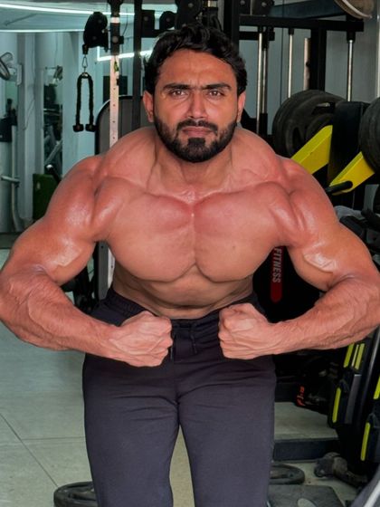 A powerful front double bicep pose.