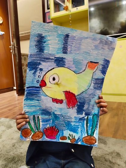 The art of drawing and coloring. This simple fish drawing is a perfect exercise for practicing blending with oil pastels and creating a vibrant underwater scene.