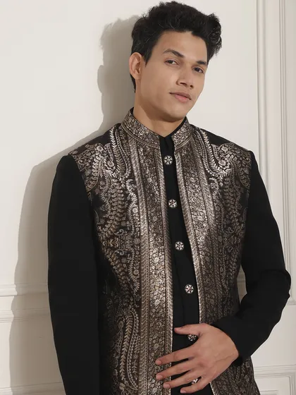 A closer view of the silver embroidery on this black Indo-Western jacket. The craftsmanship is evident in every single thread, creating a piece that is truly special.