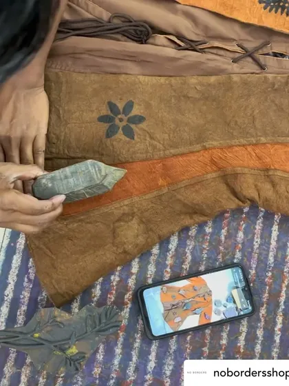 For this collaboration with No Borders, we experimented with printing on rare bark cloth. Our artisans used natural black dye to print nature-inspired motifs onto these statement jackets, bringing two ancient craft worlds together.