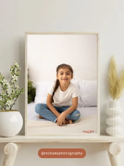 A beautifully framed portrait of a girl with a simple, genuine smile. Sometimes the most minimal setups create the most magical and timeless photos.