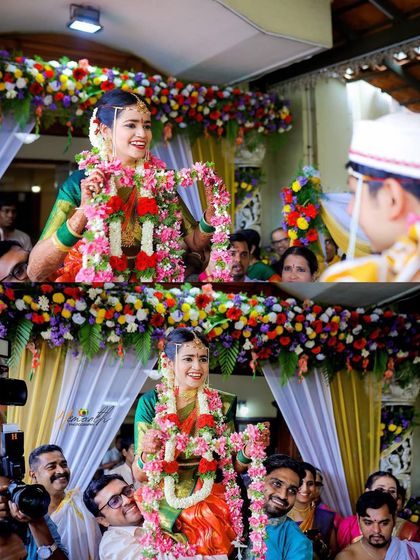 The Kanyādāna, where the bride is carried by her brothers, is a visually stunning and emotional moment. I position myself to capture the bride's joyful expression as she sees her groom.