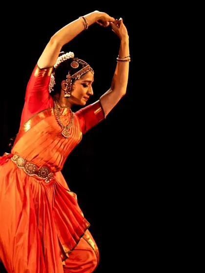 A powerful pose captured during a solo recital. The energy and precision in such moments are the result of years of dedicated training and practice.