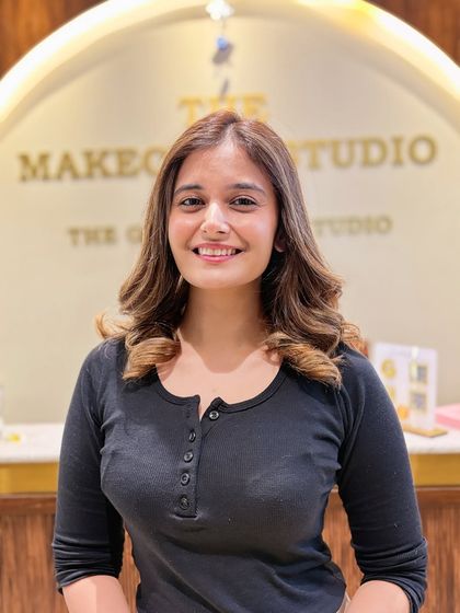 The smile says it all. After her balayage transformation, her hair looks brighter, healthier, and perfectly styled to complement her features.