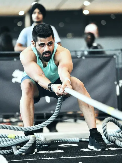 The sled pull is a brutal test of full-body strength and endurance. This is where your training, nutrition, and mental fortitude all come together.