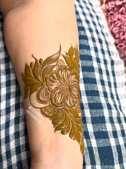 A close-up of a single, beautifully shaded hibiscus flower. The 3D effect makes it look like it's blooming on the skin.