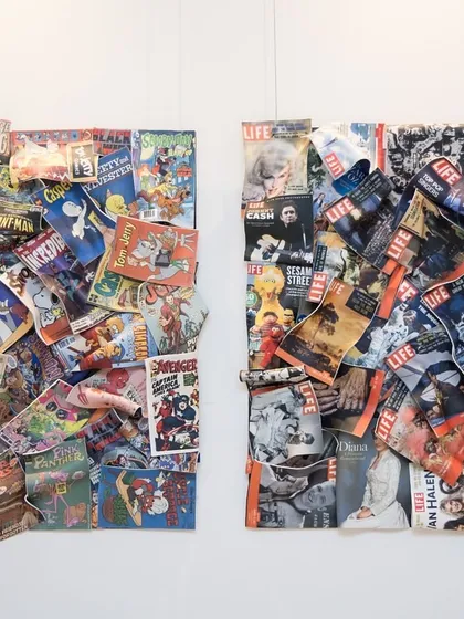 "Comic Confluence" and "Chronicles of Life" are two acrylic installations that pay tribute to visual storytelling. One celebrates the legacy of comic books, while the other features iconic covers from Life magazine.