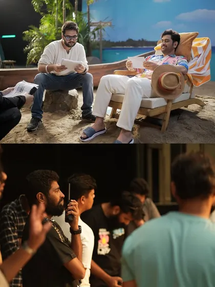 Behind the scenes of a Cleartrip commercial with MS Dhoni and Carry Minati. This shot shows the relaxed atmosphere on set as the director and talent review the script.
