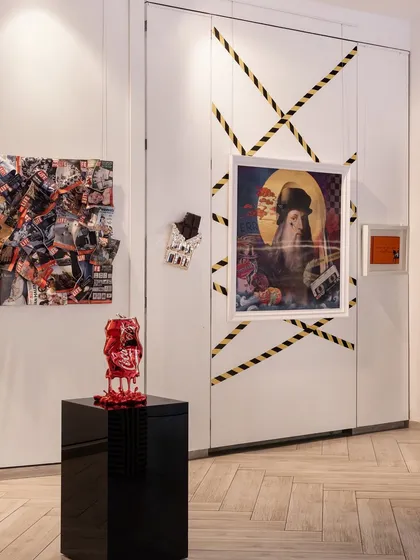 Coke cans, caution tape, and classic art. Nothing in this frame is accidental. It’s a curated corner that embodies our philosophy: chaos with intent.