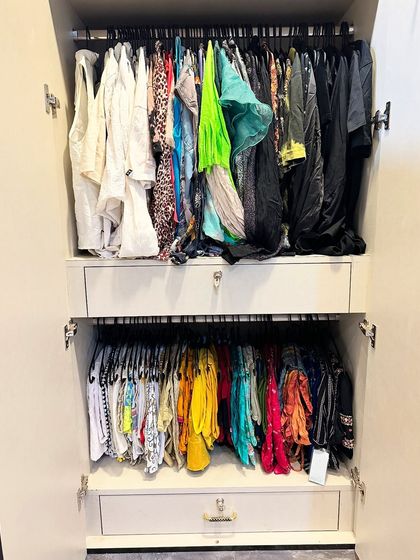 Hanging space is sacred in a wardrobe. We always recommend using it for your most-worn items. It's easier to maintain than folding and allows you to see all your options at a glance.
