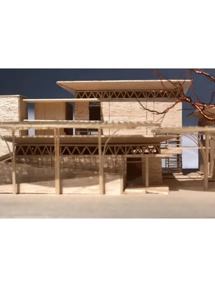 The layered elevation of the model shows the complex spatial connections between walkways, courts, and streets that define the campus.