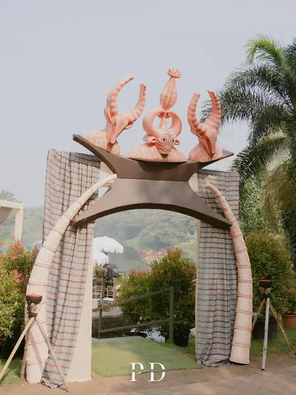 The unique, tribal-art-inspired entrance arch for the 'Afro Jungle Carnival'. This piece was custom-designed to set the tone for a unique and adventurous celebration.
