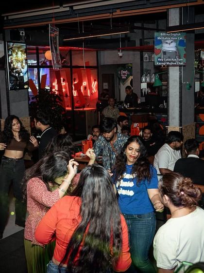 People dancing and enjoying the music at one of my gigs. It's all about creating a fun and safe space for people to let loose.