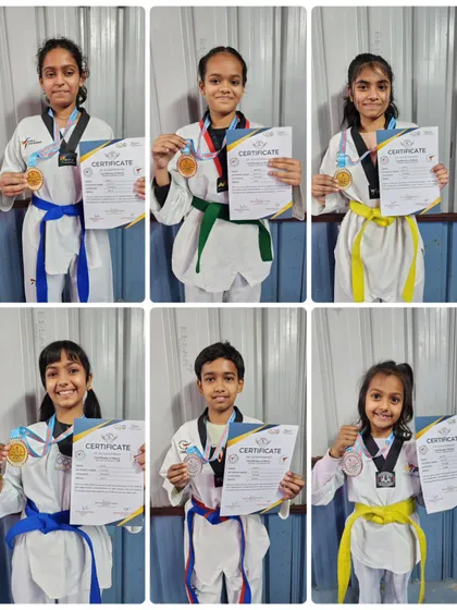 A group of my female students showing their medals from the 11th Winter Cup Taekwondo Championship.