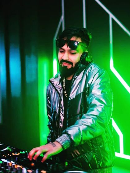 A cool shot of me at the console, surrounded by green lights. The right lighting can completely transform the vibe of a party.