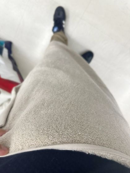 You can almost feel the softness from this photo. This is a close-up of the towel's texture, showing the dense cotton loops that make it so plush and effective at drying.