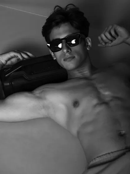 A retro-inspired black and white shot with sunglasses and a boombox. This shows my ability to play with different themes and eras.