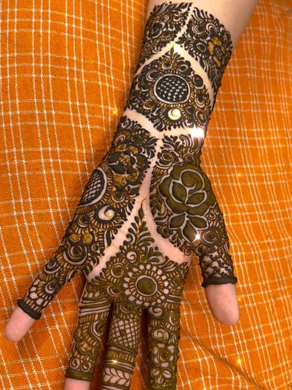 A designer piece that combines the boldness of Arabic designs with the intricacy of Indian patterns.