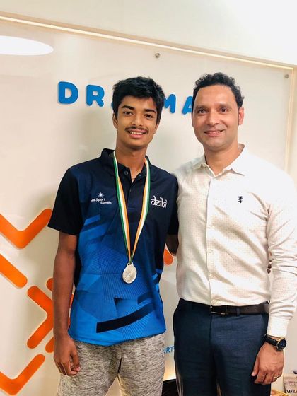 Posing with young tennis champion Ayush Sharma, who won a silver medal in the U-19 State Tennis Championship. We are proud to support the next generation of athletes on their path to success.