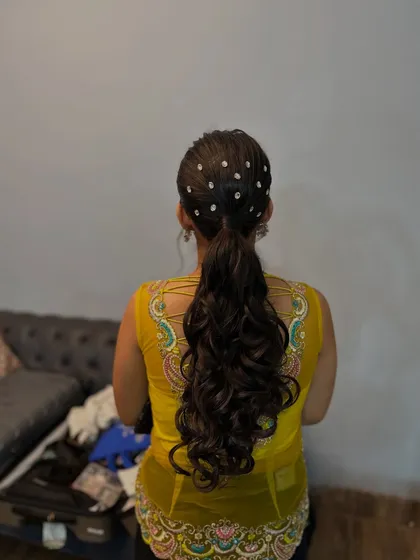 Another angle of the crystal-adorned ponytail, showing how it catches the light.