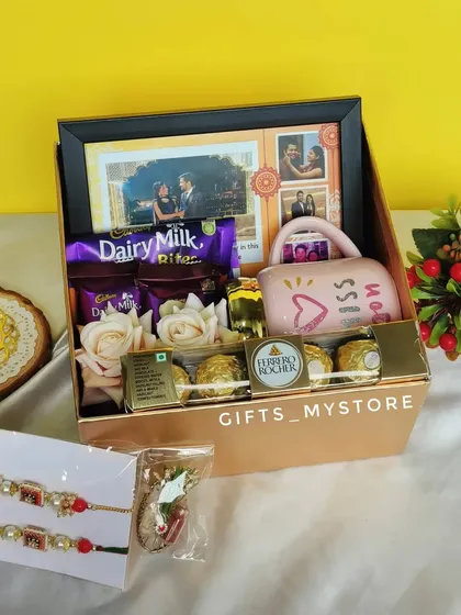 A full view of the long-distance brother Rakhi hamper, packed with all his favorite chocolates and a handmade Rakhi.