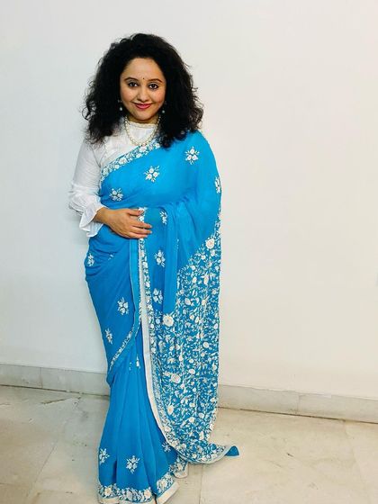 This Phulkari saree, with its beautiful 'flower work' embroidery from Punjab, is a heritage piece. Having a traditional yet elegant saree like this in your wardrobe is perfect for festive celebrations and special events.