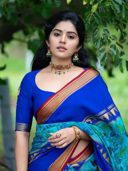 Another beautiful shot of Megha Shetty, capturing her elegance and the vibrant colors of her traditional outfit.