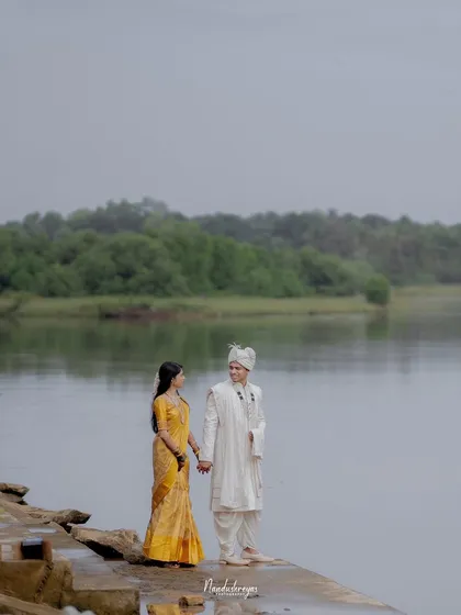 Your love story deserves a beautiful backdrop. I specialize in finding scenic locations, like this serene riverside, to create epic, romantic portraits that feel as grand as your love.