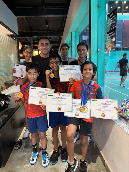 Nothing beats seeing the pride on my students' faces. Here's my gang of young champions after a successful tournament, showing off the medals they earned through hard work and dedication.