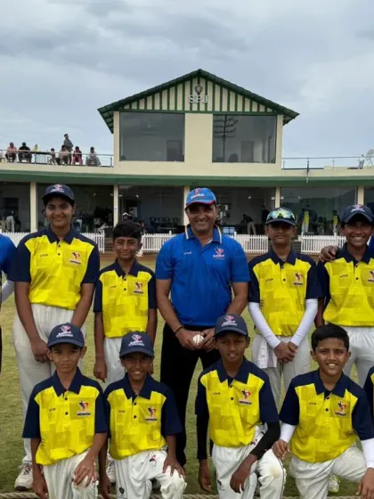 A pre-match team photo of one of our U-14 squads with their coaches on the field. This showcases the professional setup and team unity before a competitive game.