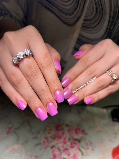 This is the ultimate Barbie look. A vibrant, glossy pink with a chrome finish that gives it an iridescent shine, perfect for anyone who loves a bold and feminine style.