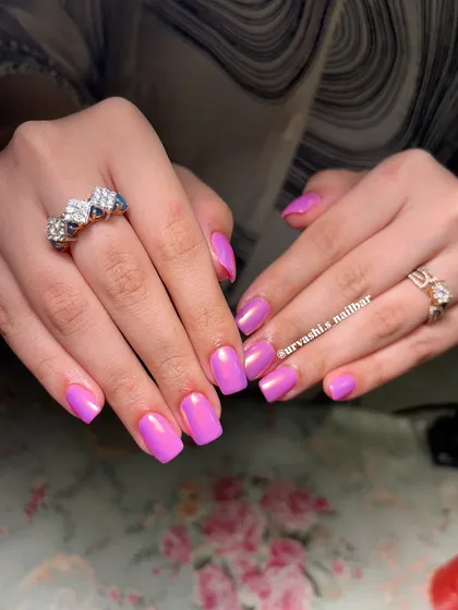 This is the ultimate Barbie look. A vibrant, glossy pink with a chrome finish that gives it an iridescent shine, perfect for anyone who loves a bold and feminine style.