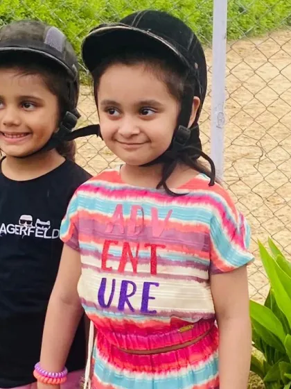 A close-up of two friends excited for their riding adventure. We see so many friendships blossom here.