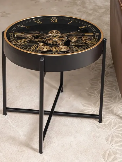 This showstopper piece doubles as a table and a clock. The intricate golden gears and Roman numerals create a timeless look, while the black metal frame provides sturdy support.