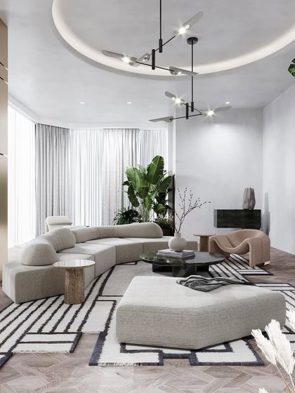 An overhead view of a living room concept, showing how a geometric rug can define the space. The design blends the raw elegance of concrete walls with stunning, soft-lined furniture pieces.