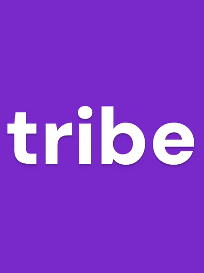 the 'tribe' logo on a solid purple background. testing logos against different brand colors is a key step in my design process.