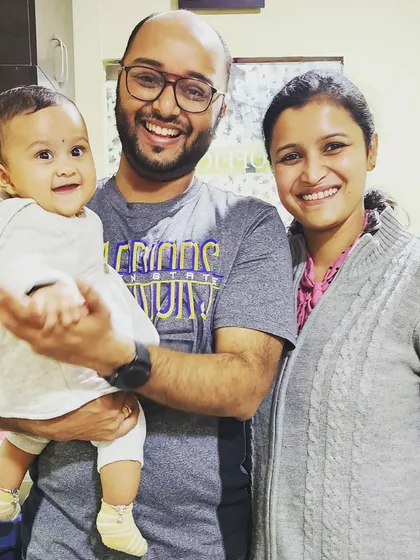 We are pictured here with a student and her happy, healthy baby. Her dedication to our prenatal yoga program for over six months is a testament to the journey we take with our clients. Seeing the joy and well-being of both mother and child is the greatest reward of our work.