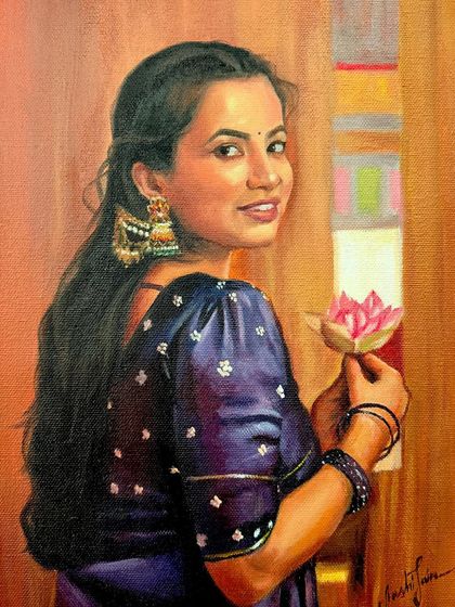 A lovely portrait of a woman in a purple saree holding a lotus flower. The client commissioned this as a gift, and I was so happy to capture her grace.