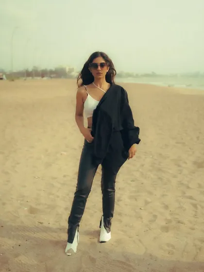 An editorial-style beach shoot with an edgy, high-fashion look. The mix of color and black and white images shows the versatility of a single location.