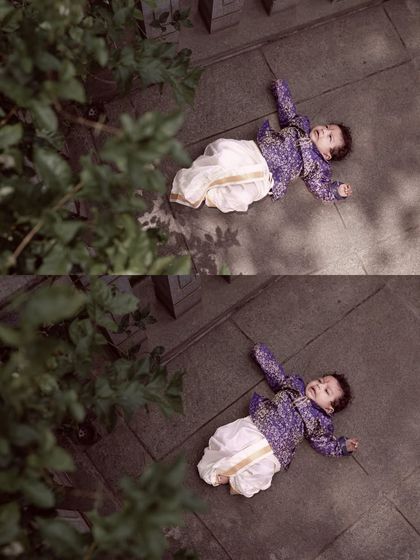 A humorous and candid moment of a baby lying on the ground during a photoshoot. This overhead shot captures the unpredictable and funny side of photographing little ones.