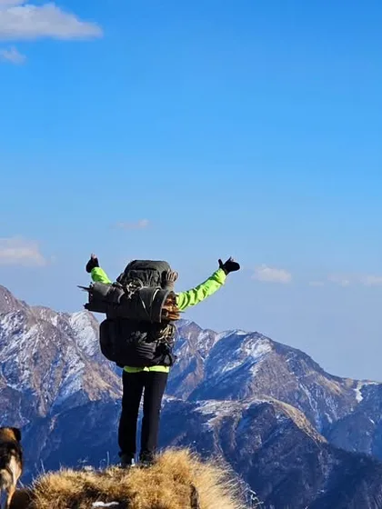 There's no feeling like reaching the summit after a long climb, with a loyal friend by your side. This is what we train for: moments of pure freedom against a backdrop of the Himalayas. Building the endurance for high-altitude trekking means you can say yes to views like this.