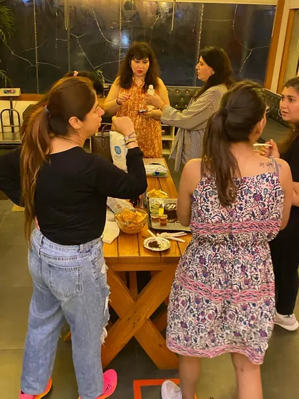 A candid shot of our members mingling. The connections made here go beyond the dance floor.