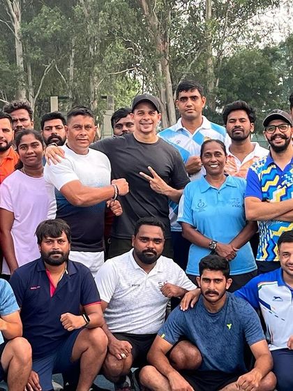 A group photo with fellow coaches and athletes. The community aspect of coaching is something I deeply value.