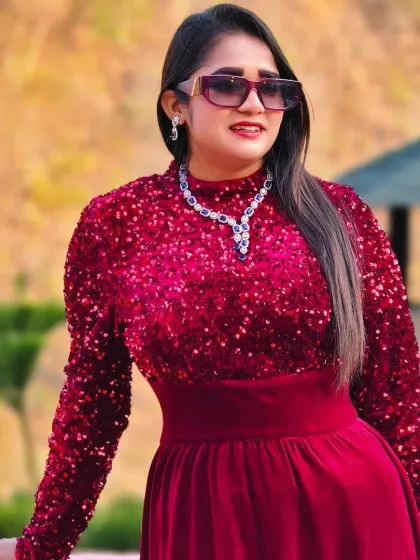 Dressed in a regal red gown for a destination silver jubilee wedding at Raga on the Ganges. Anniversaries are a chance to celebrate love all over again, and I make sure it feels just as grand as the first time.